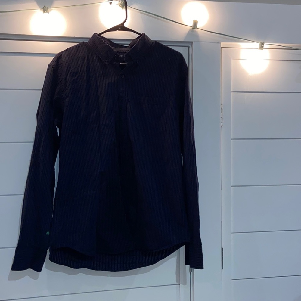 Long sleeve button up. Has black and navy stripes. Only been worn once.
